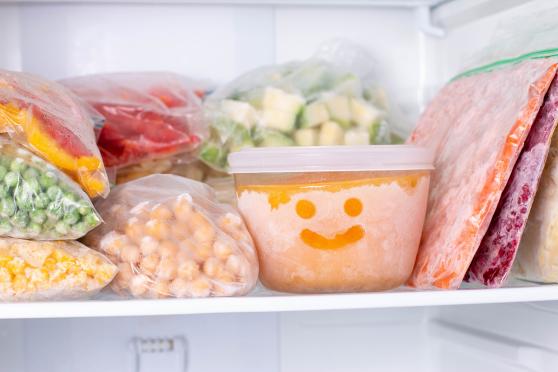 Mix of frozen foods in freezer